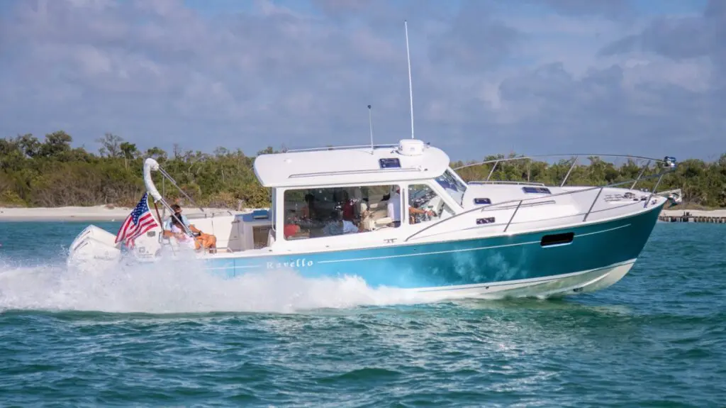 A boat with people on it in the water.